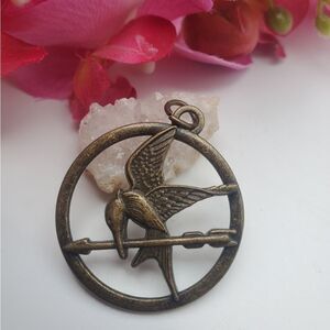 Mockingjay bronze necklace pendant